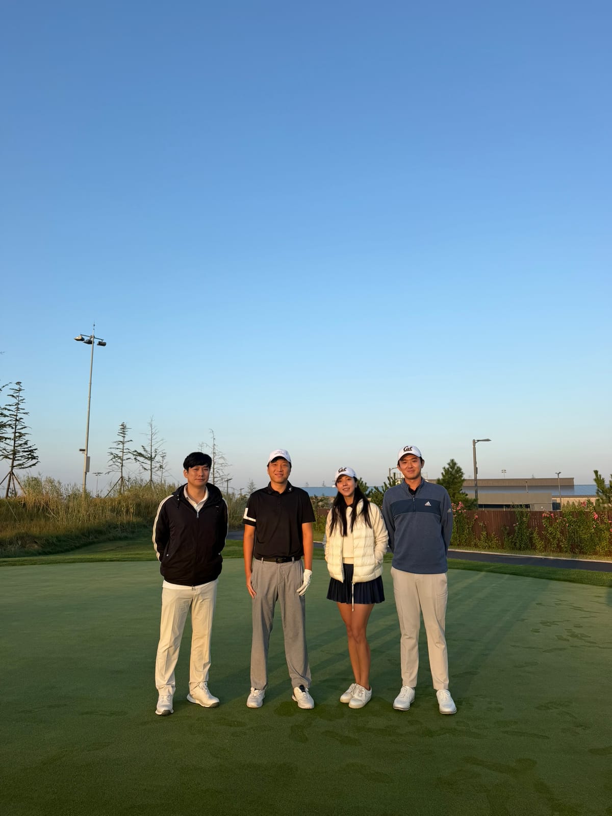 Golfers on the green in the morning