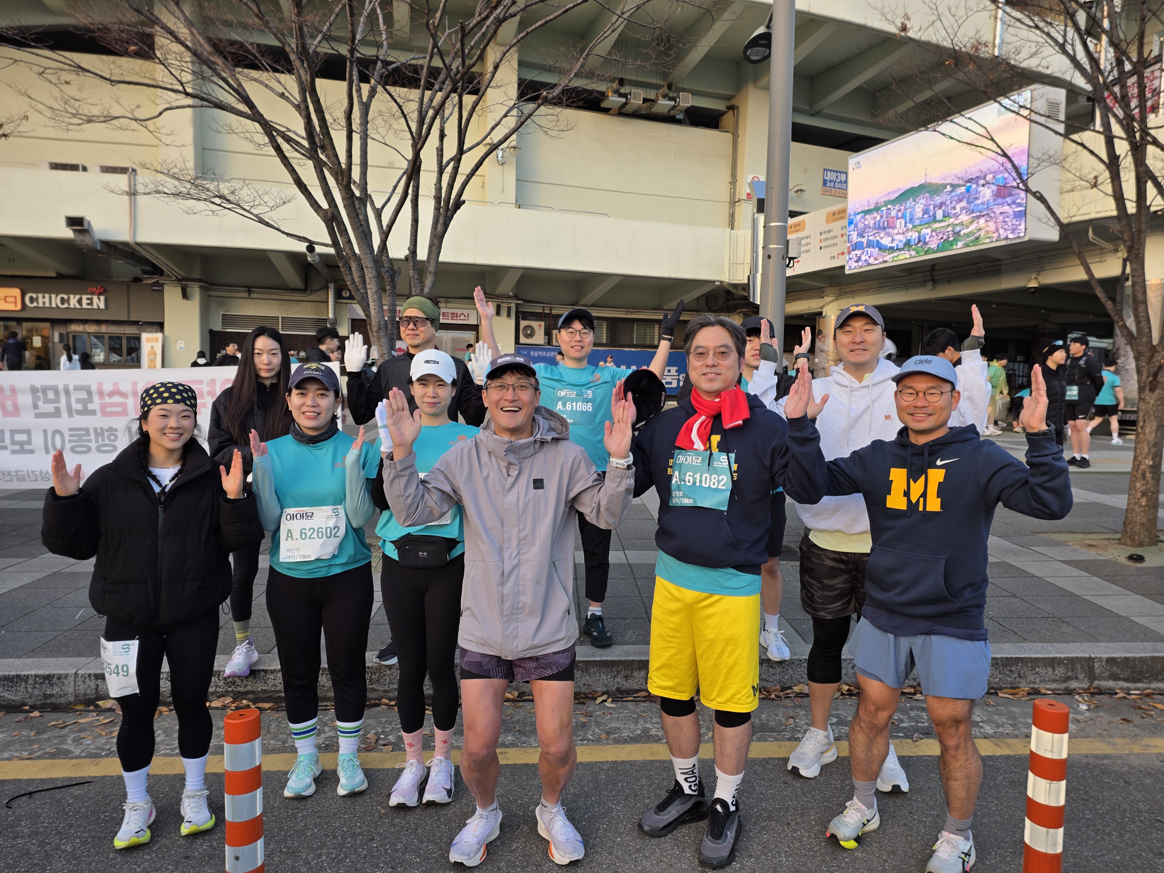 Alumni crossing the finish line at the 10K marathon